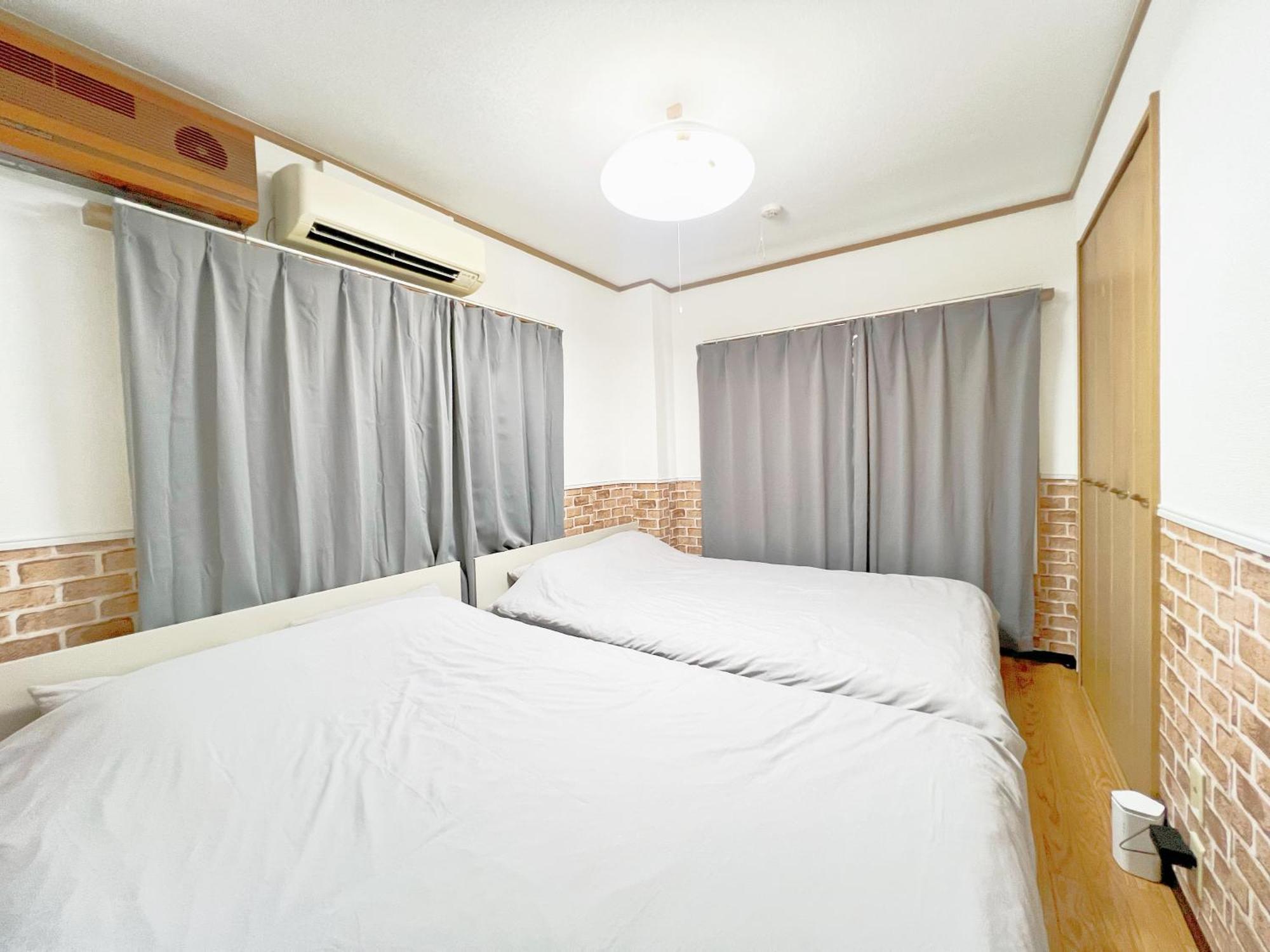 西武新宿線 駅近6人可 C01 Habitación en casa particular Tokio